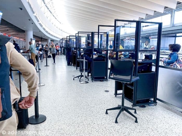 airport security line covid-19 pandemic airport security line covid-19