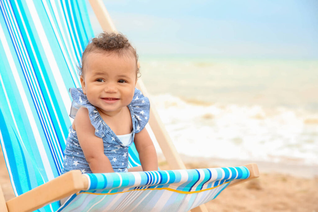 baby girl of color beach chair