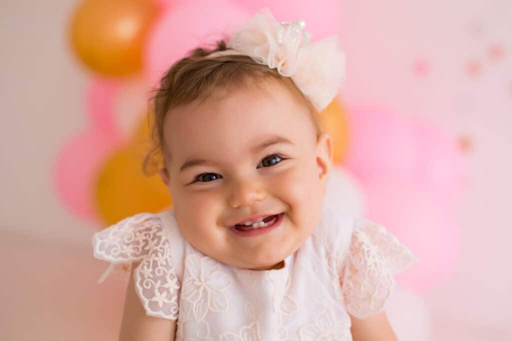 smiling baby girl lace dress headband