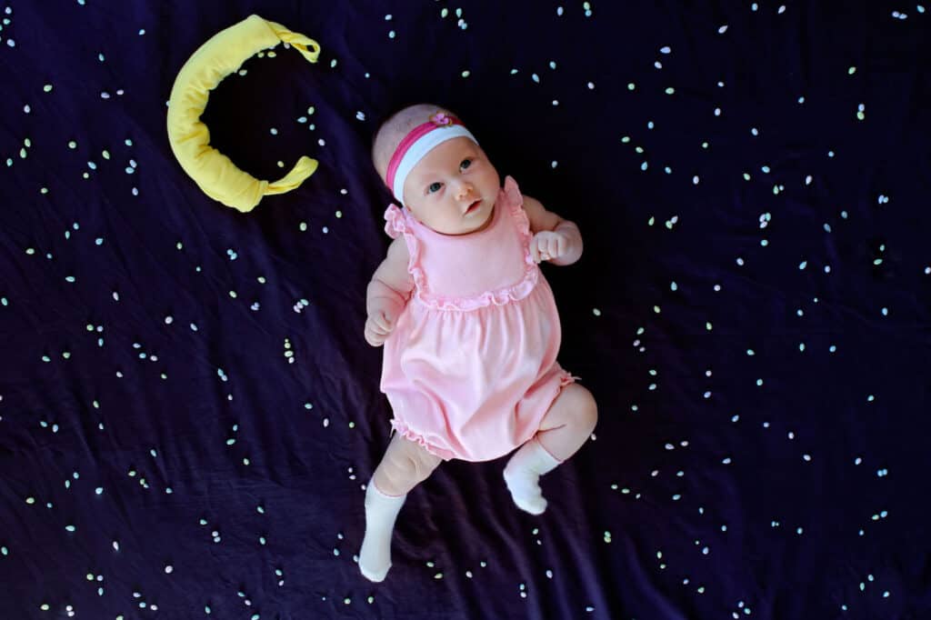 baby girl pretend outer space moon scene