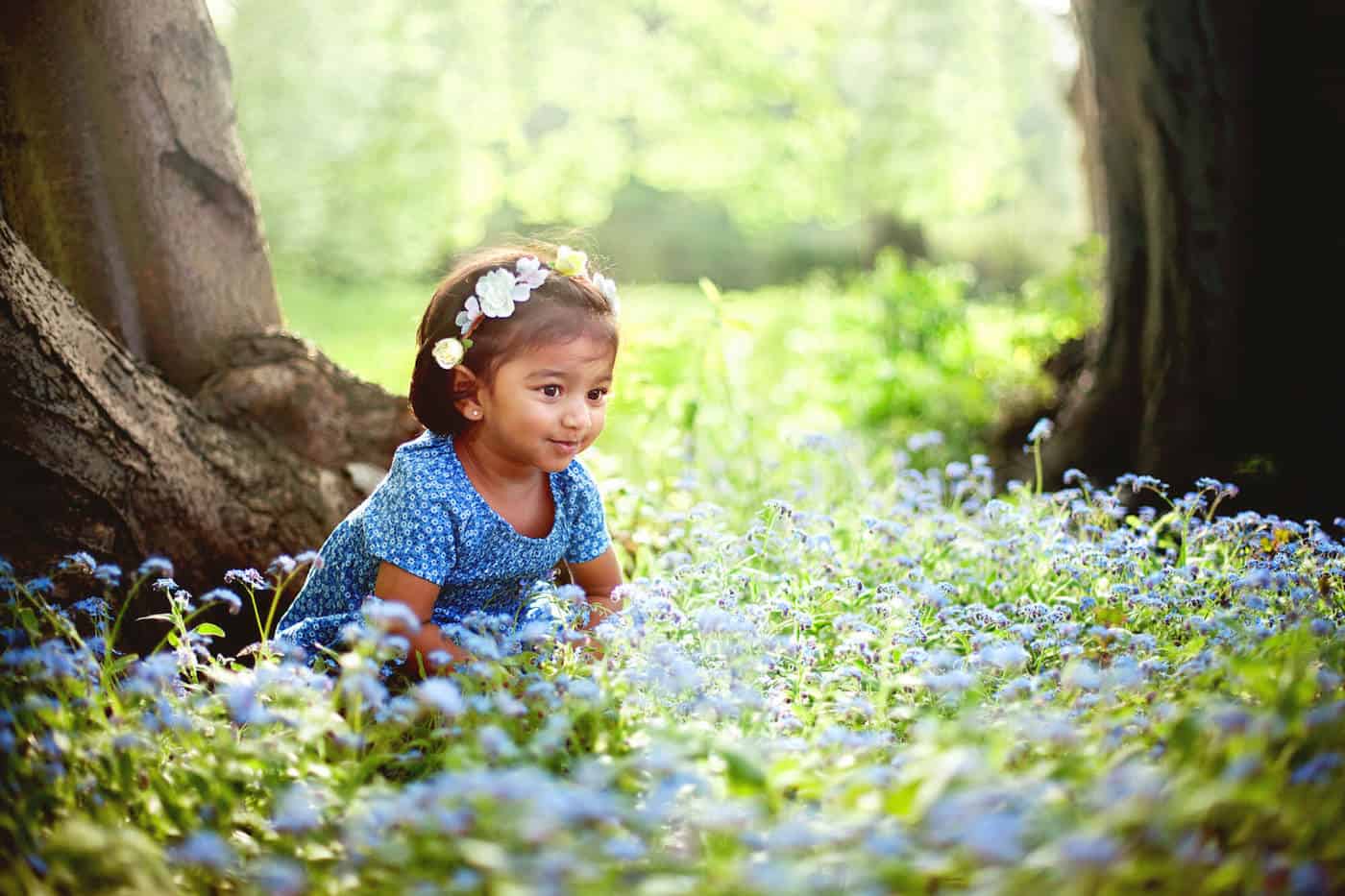 little girl surrounded by nature