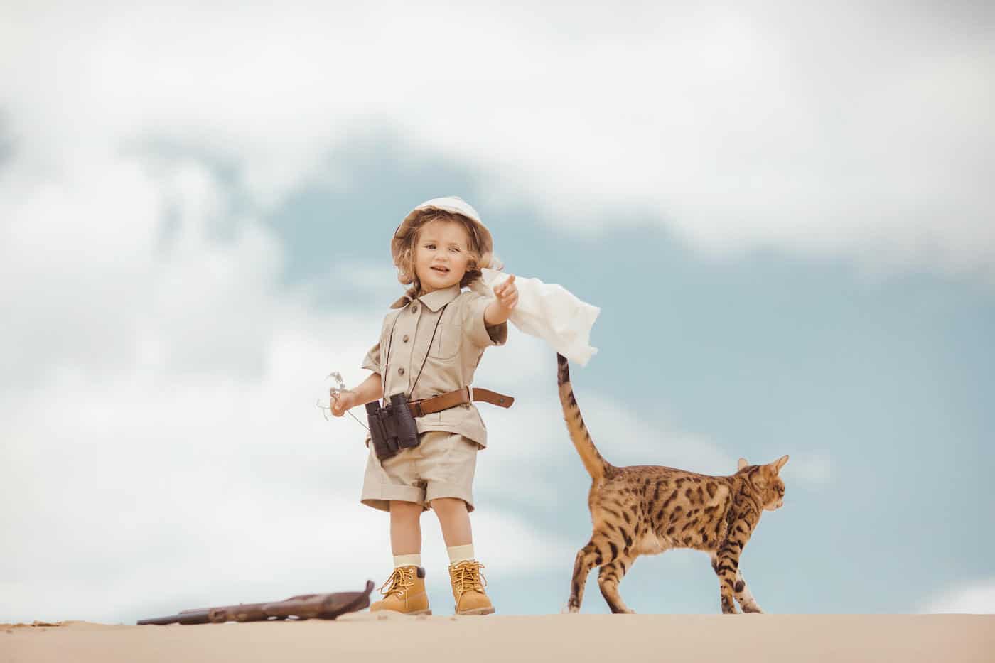 little explorer girl in exotic desert