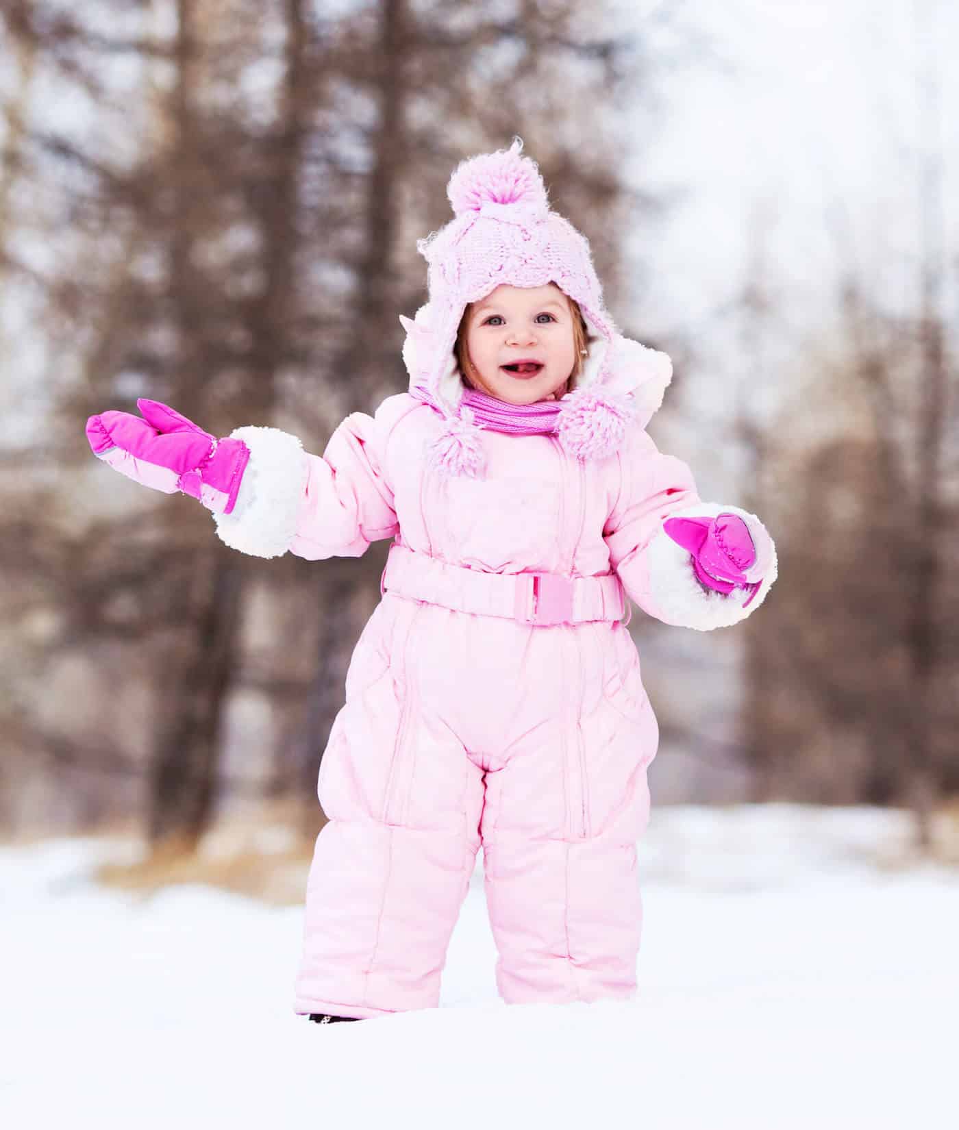 little girl in snow winter environment