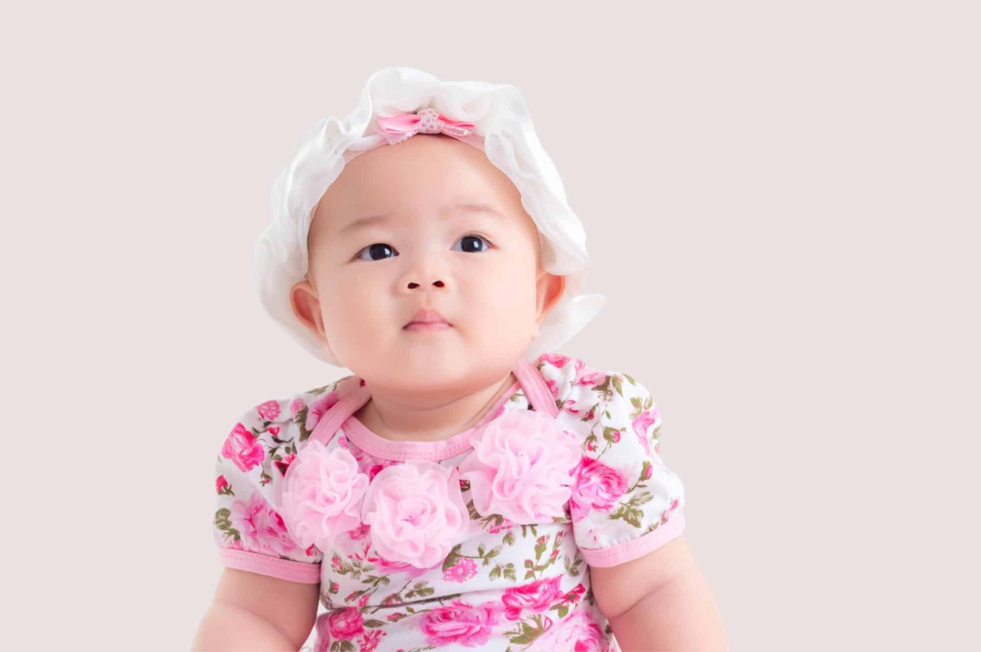 baby girl dressed in classic outfit