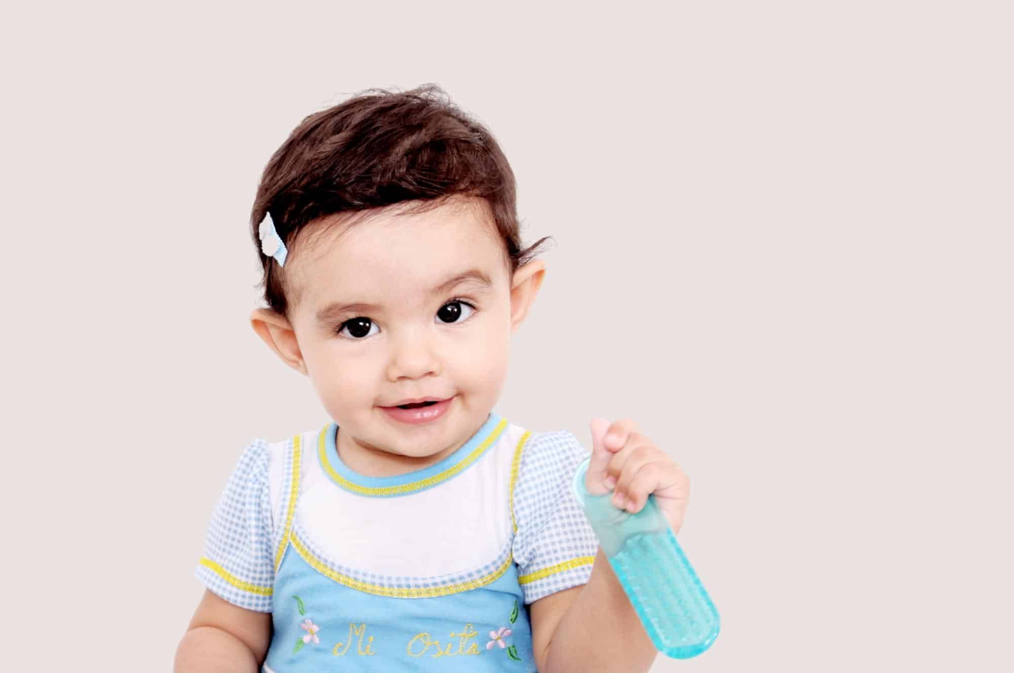 cute baby girl in blue and white dress