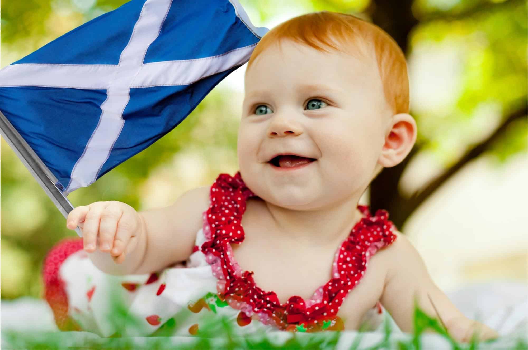 redhead baby girl with scottish flag
