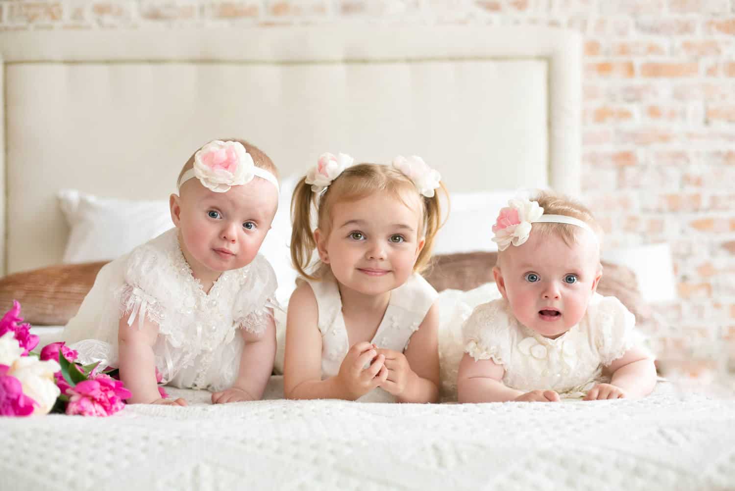 twin baby girls with older sister