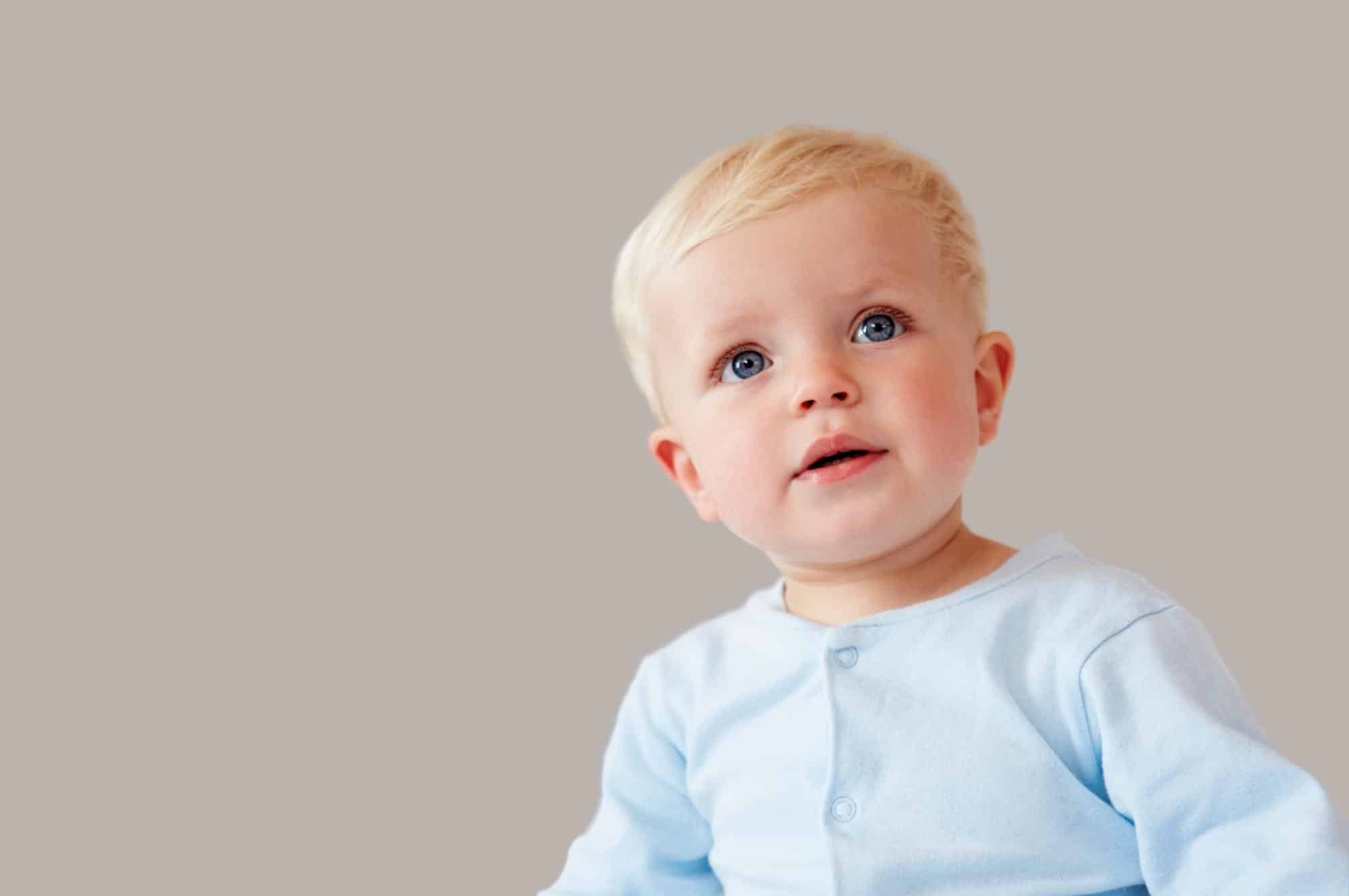 baby boy with blue shirt light hair