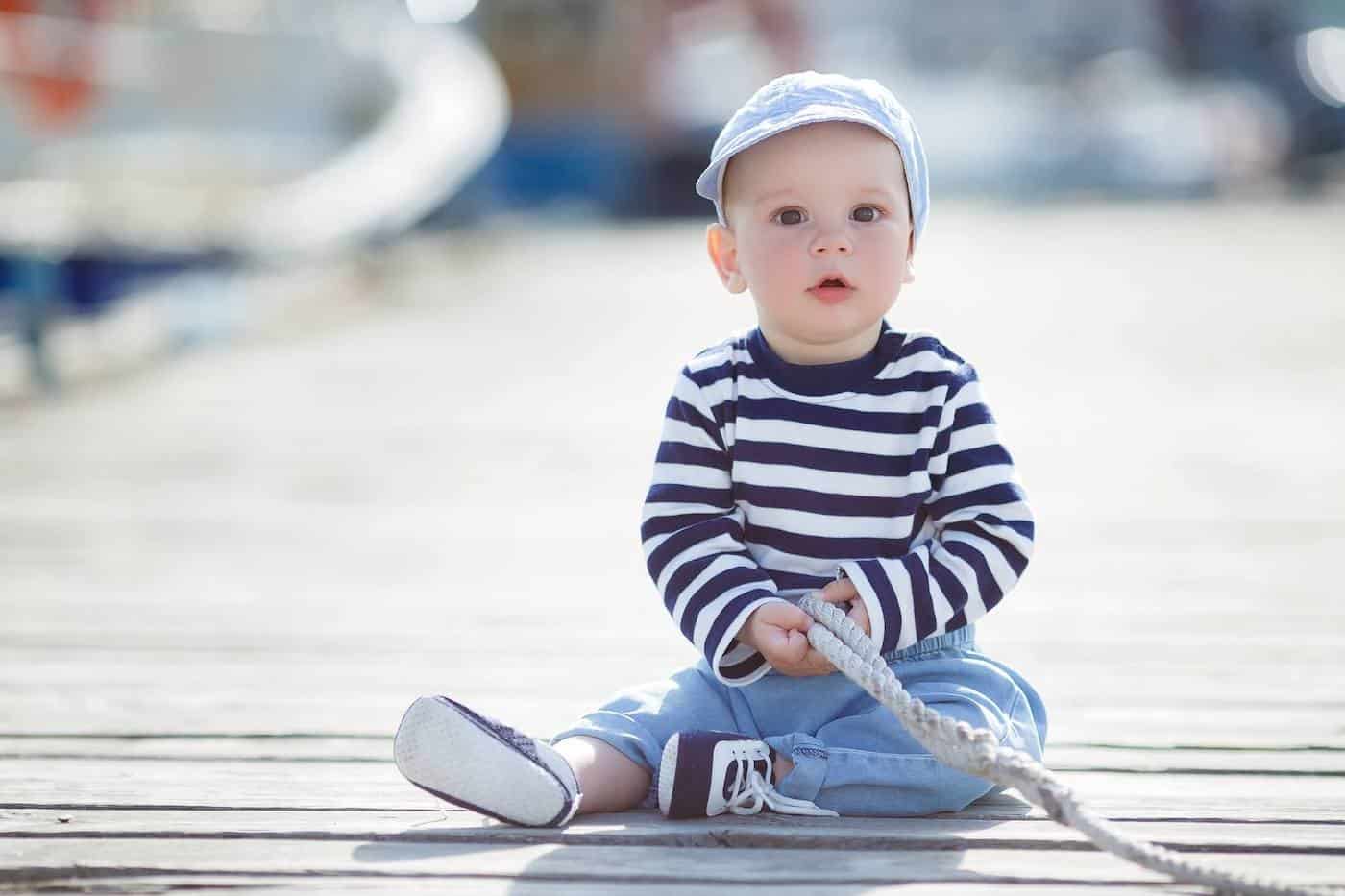 baby boy striped shirt sitting