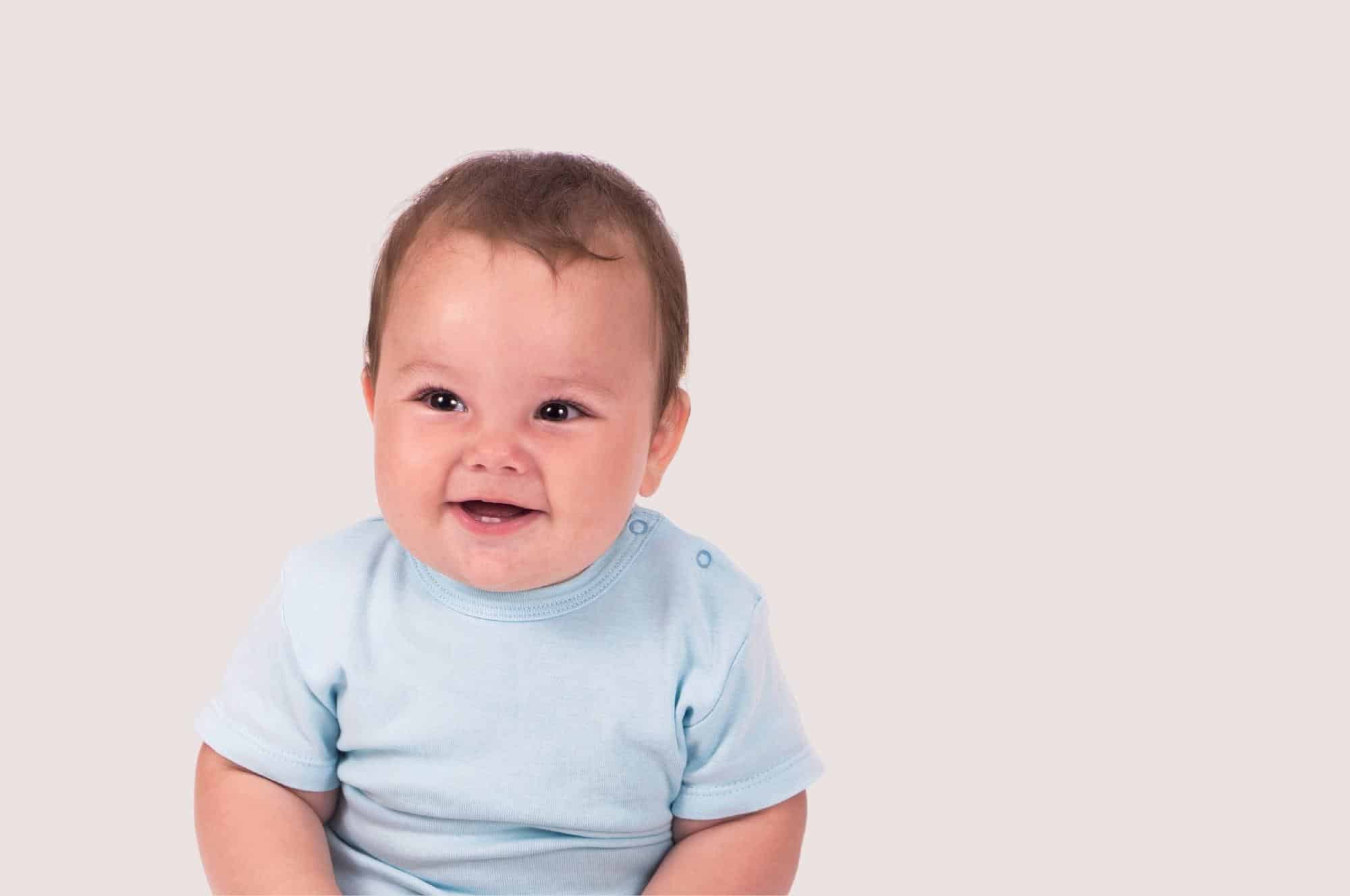 baby boy smiling blue t shirt