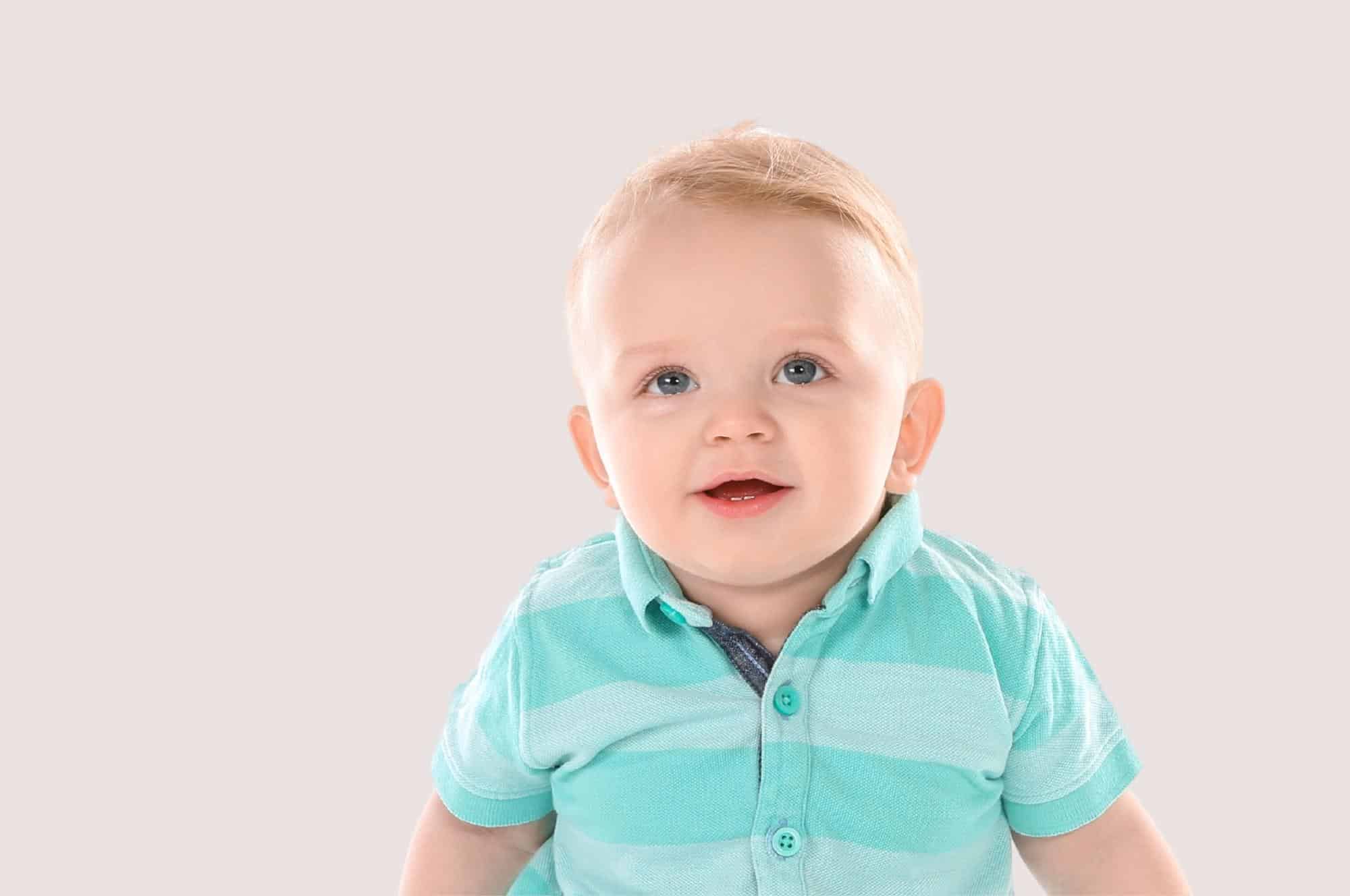 baby boy in turquoise polo