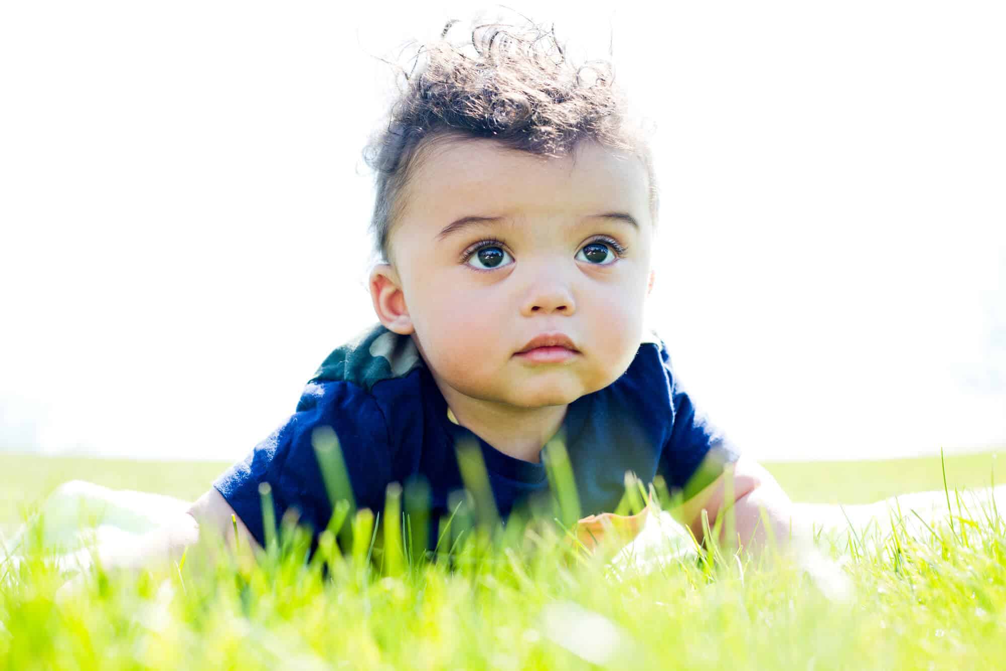 baby boy in grass outside
