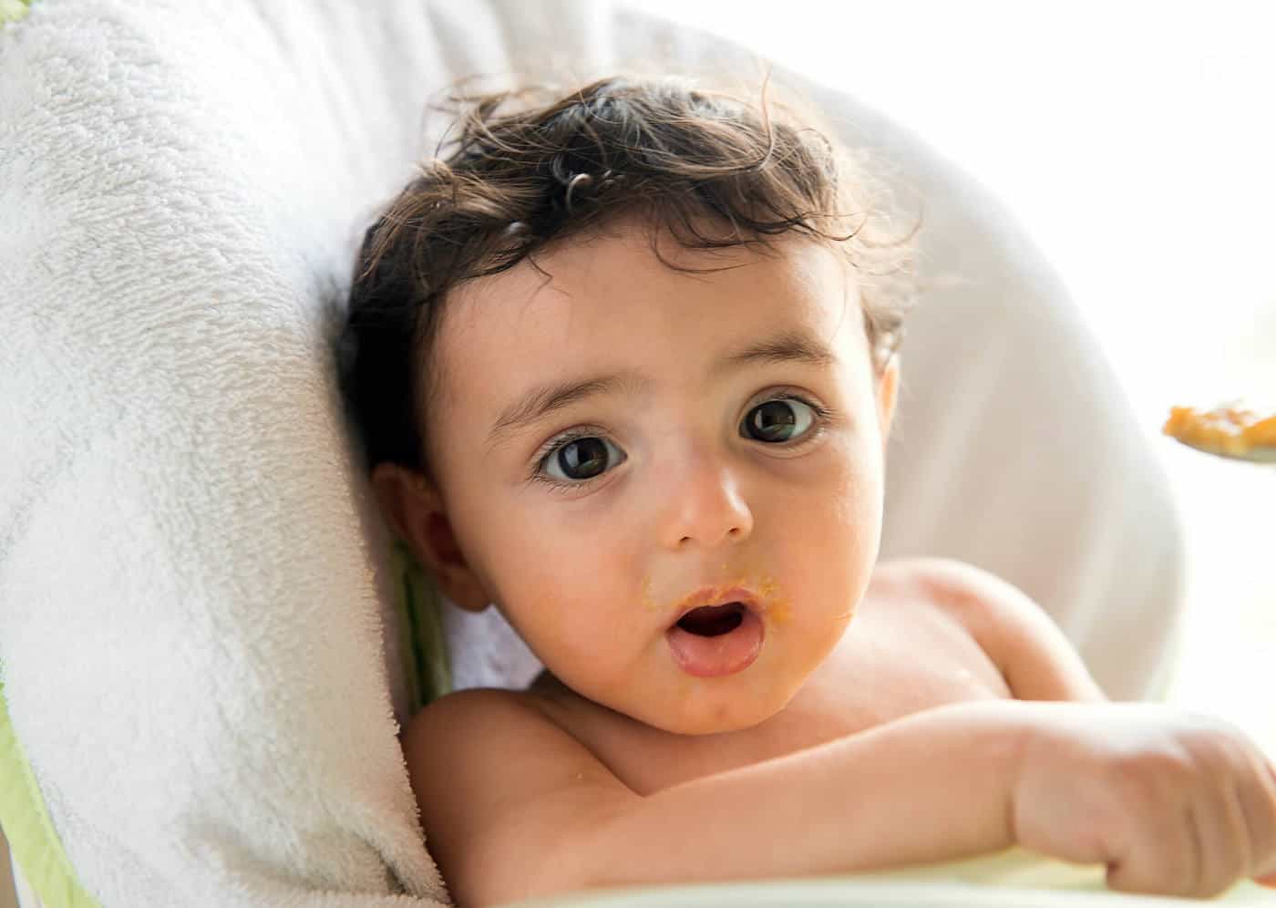 italian baby boy in high chair