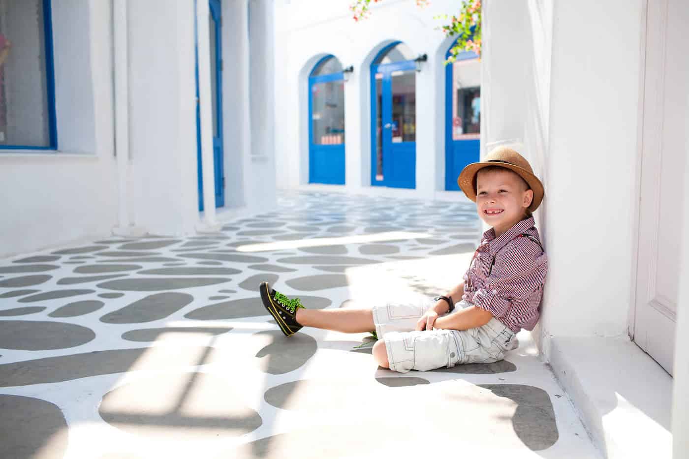 little boy greek city street