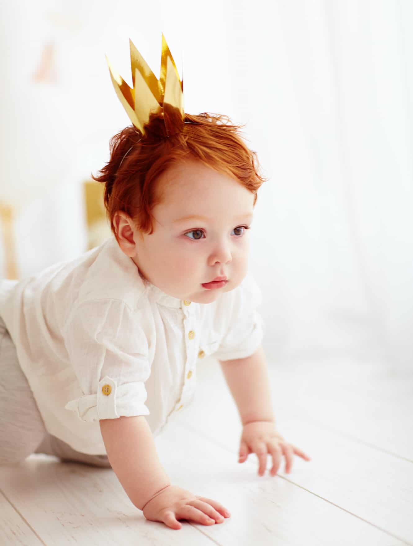 red head little prince with crown