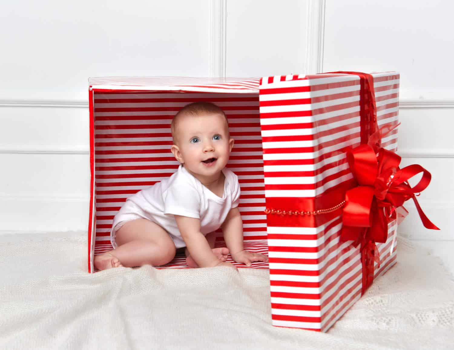 baby boy inside gift box