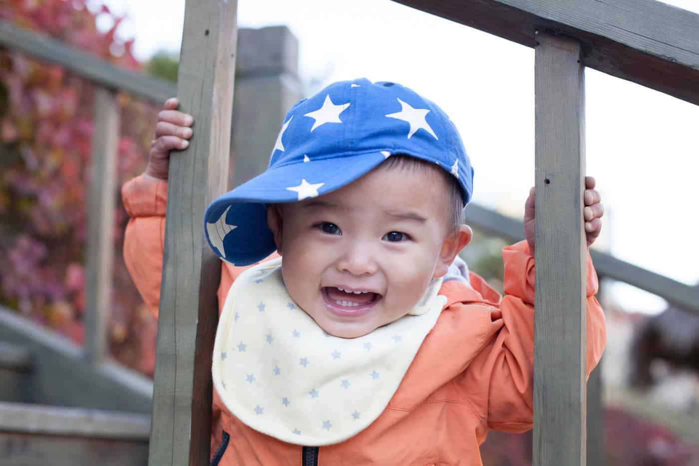 baby boy wearing baseball cap with stars