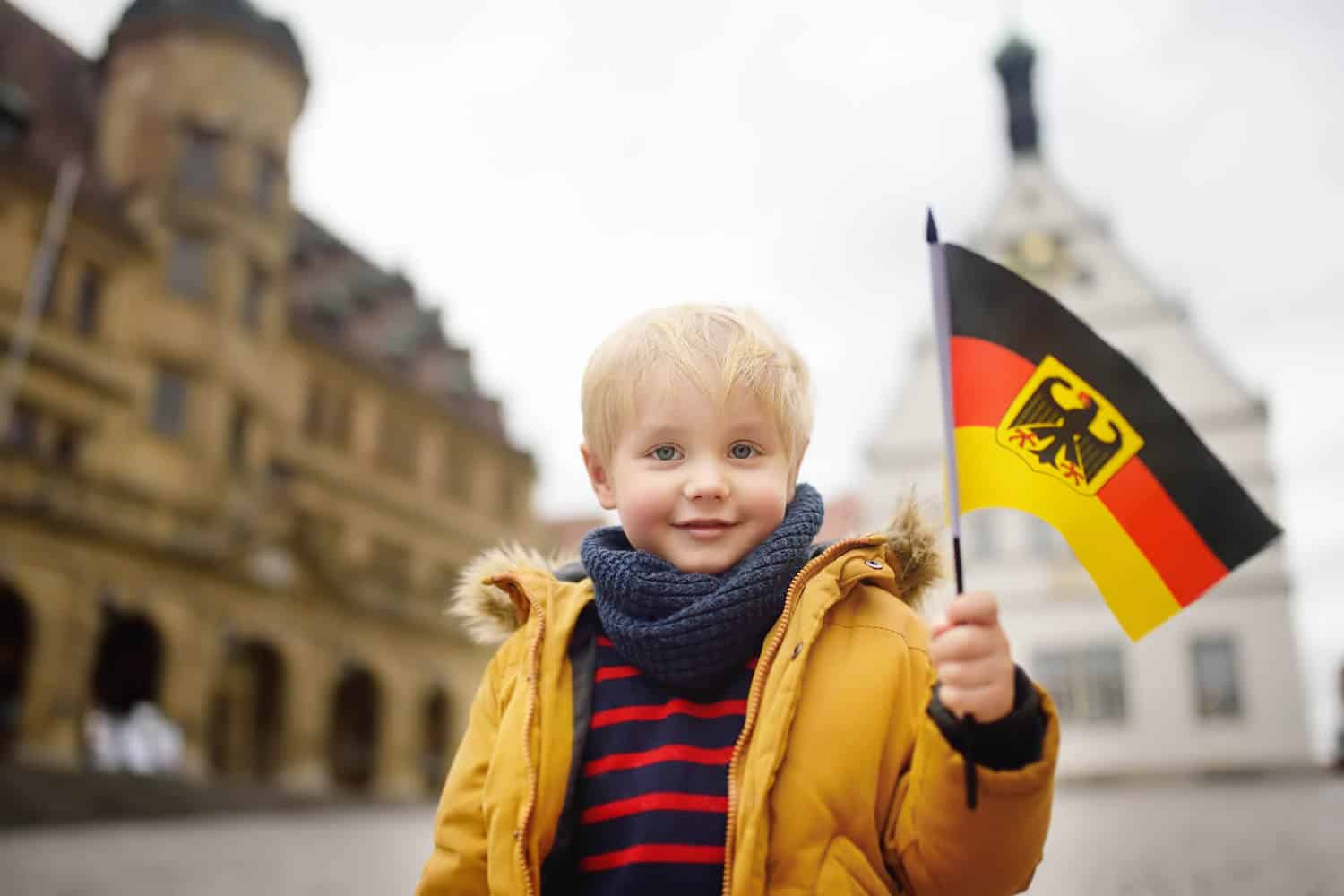 little boy waving german flag
